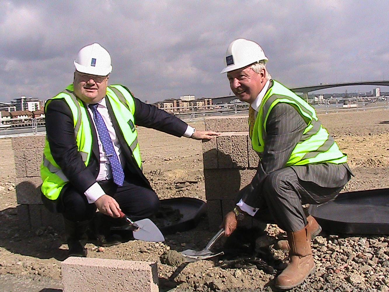 <p>Eric Pickles lays the foundations for new homes in Southampton. <em>Image credit Department for Communities and Local Government</em></p>